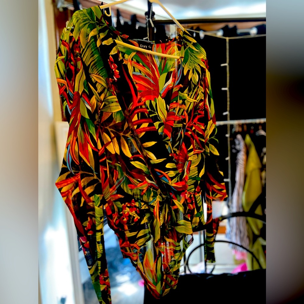 Deep plunge floral bodysuit